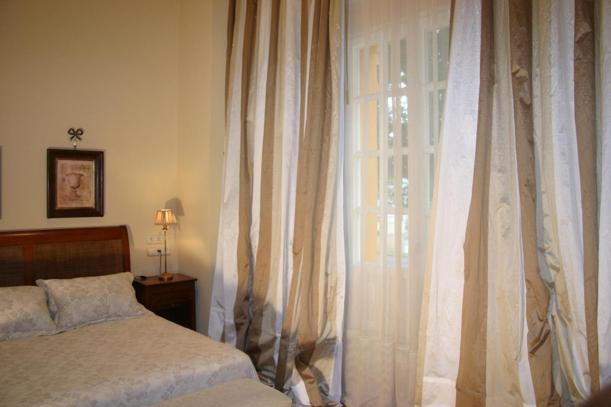 Hotel Arcea Palacio De Las Nieves Лангрео Номер фото